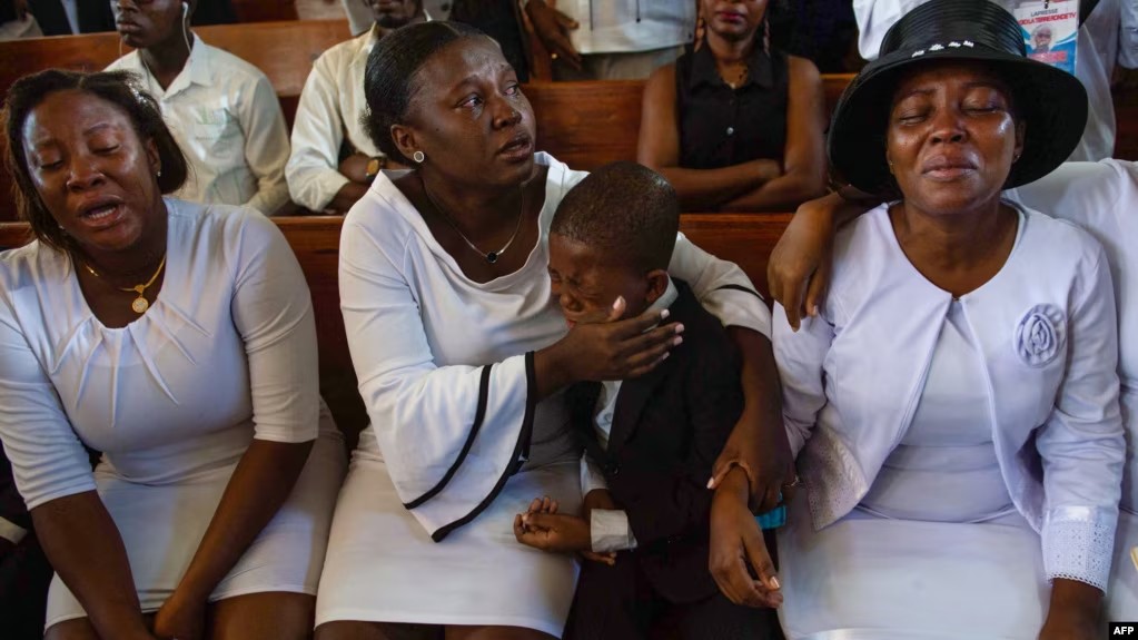 Journalists in Haiti demand justice, bury 2nd colleague killed by gangs